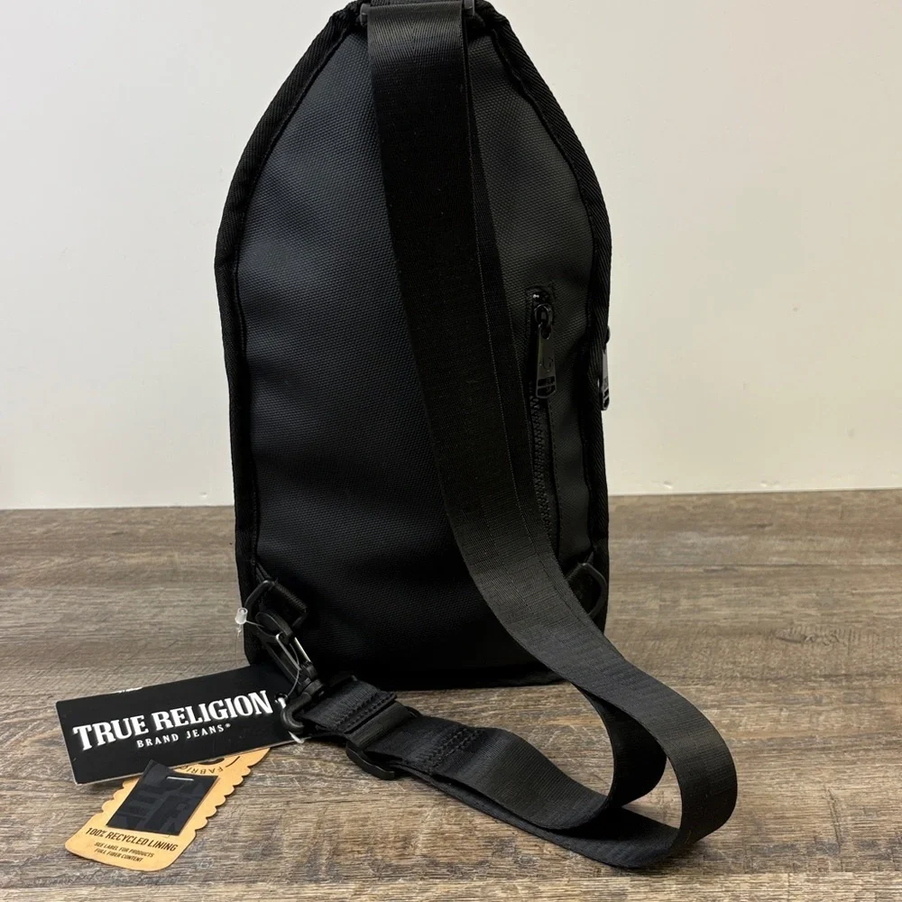 True Religion “Jody” Sling Bag | Black Logo Lined Crossbody
